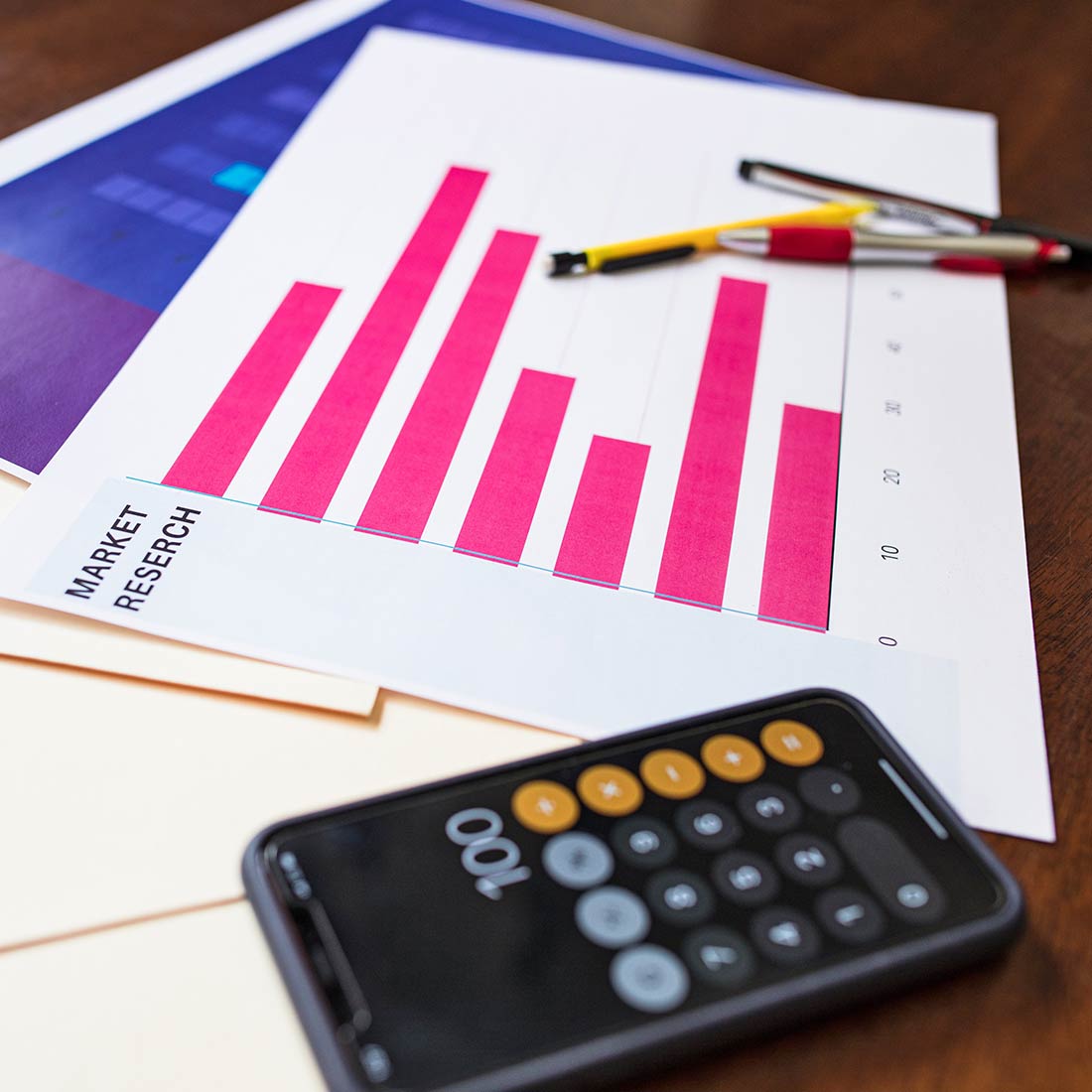 Man Working on Phone and Laptop Man Working on Phone and Laptop